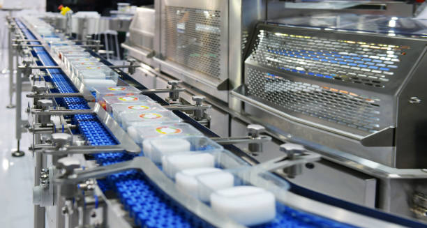 istock Food products boxs transfer on Automated conveyor systems 1042346320
