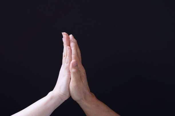istock Male and female hands 1042347262