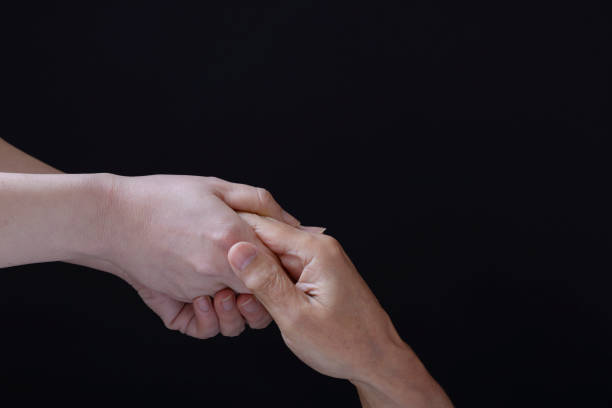 istock Male and female hands 1042347320