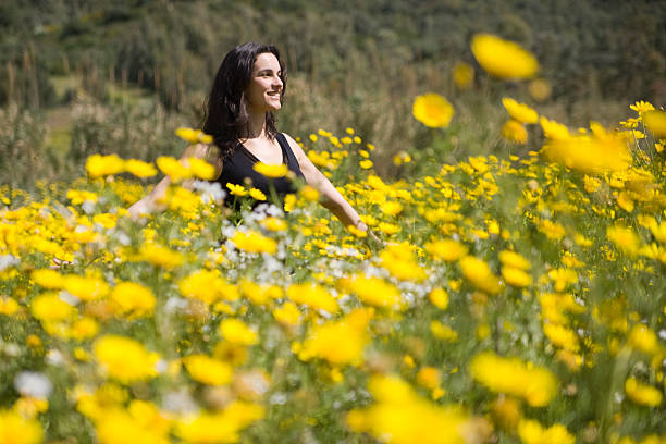 istock Spring woman with yellow flowers 104235001