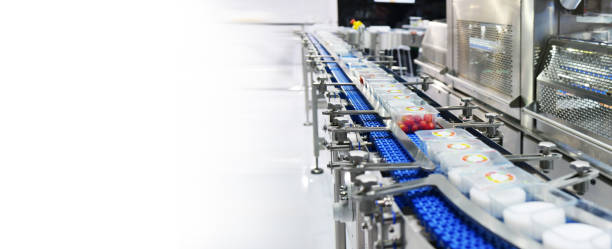 istock Food products boxs transfer on Automated conveyor systems 1042350086
