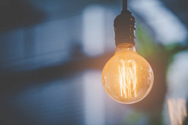 istock Motivation Idea concept - Decorative light bulbs on a dark background. 1042359366