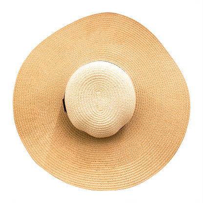 Sombrero de paja con cinta aislada sobre fondo blanco. Vista superior de sombreros de moda en el estilo de verano. (Clipping path) photo
