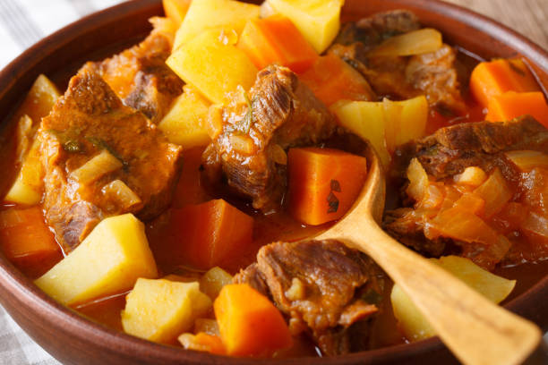 istock Mexican thick estofado soup with beef close-up. horizontal 1042360202