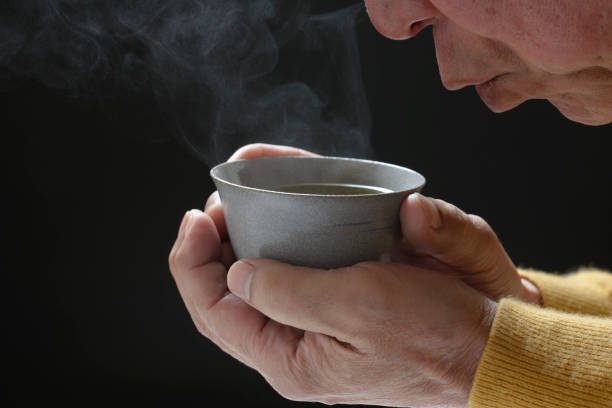 istock Senior to drink Japanese tea 1042360556