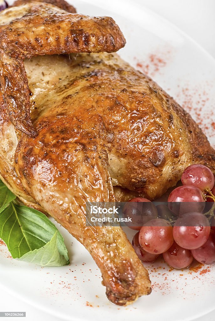 Demi-poulet grillé - Photo de Aliment libre de droits