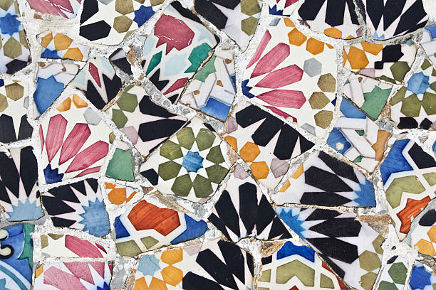 Detailed view of a set of mosaics used as decoration all around Parc Guell, Gaudi's creation, in Barcelona, Spain