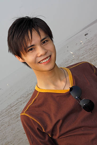 Young Man On The Beach stock photo