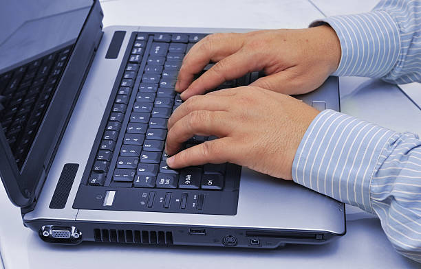 istock Man's hands on the keyboard of laptop 104237143