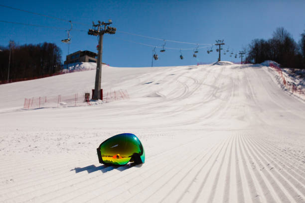 istock Bottom view on empty ski slope and equipment for snowboarding 1042373476