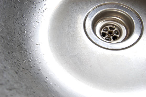 istock Steel_sink_plughole_wet 104237597