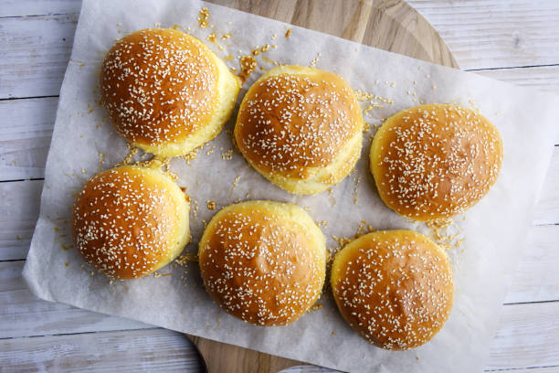 istock Homemade burger bun on parchment 1042375980