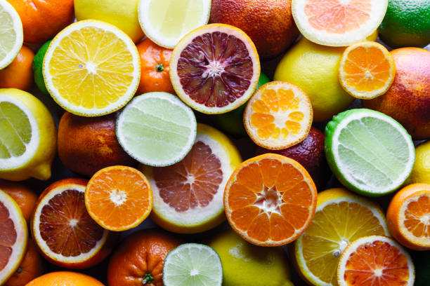 mix of different citrus fruits closeup - vitamin a letter a food orange imagens e fotografias de stock