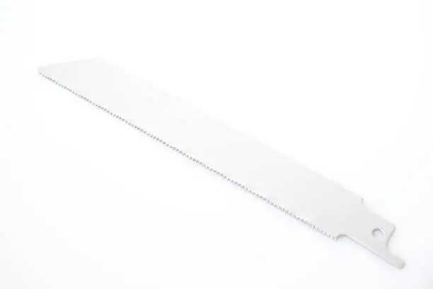 Photo of Reciprocating saw blade for metals isolated in a white background composition