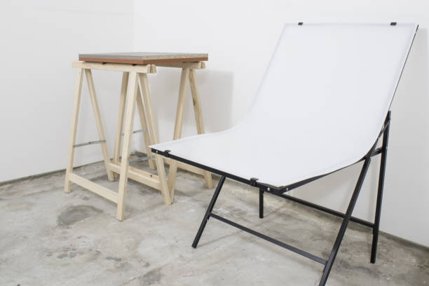 istock Photographic studio set, white amatorial still life studio composition 1042376858