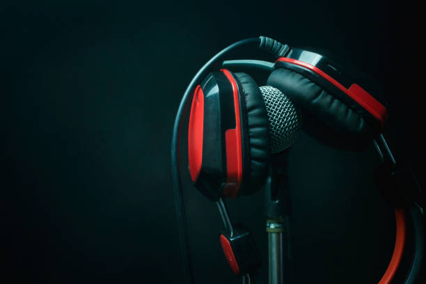 istock Microphone with red headphones 1042380560