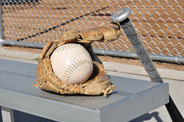 istock White Softball, Bat, and Glove 104238184