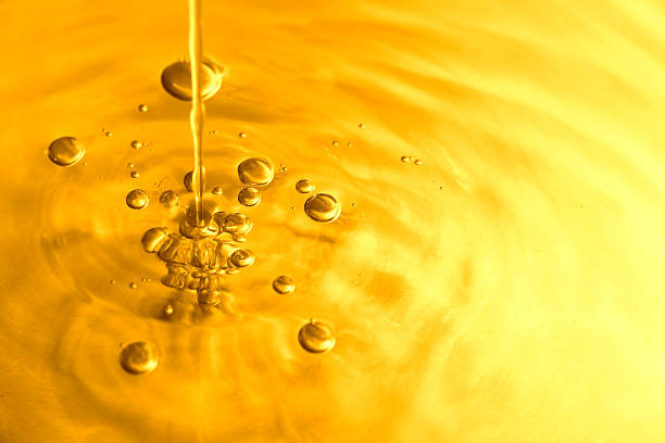 ゴールドの泡 - liquid water splashing pouring ストックフォトと画像