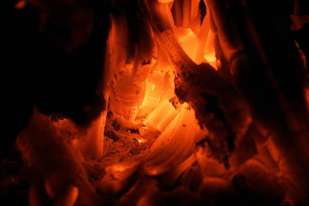 Burning Embers Closeup  michael owen stock pictures, royalty-free photos & images