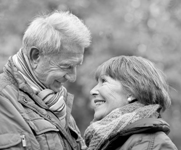 istock Cheerful Senior couple embracing outdoors in autumn 1042391764
