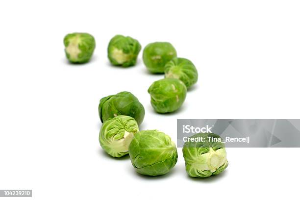 Brussel Sprouts In A Row Stock Photo - Download Image Now - Cabbage, Capital Region, Close-up