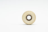 istock Close up of a skateboard wheel on white background. Complete skateboard parts 1042392988