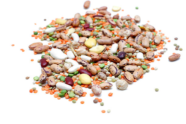 istock An assortment of mixed legumes isolated on white 104239634