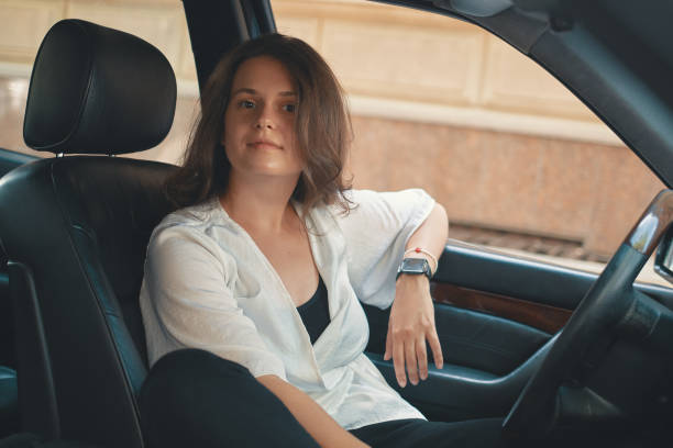 istock Portrait confident woman driver 1042398718