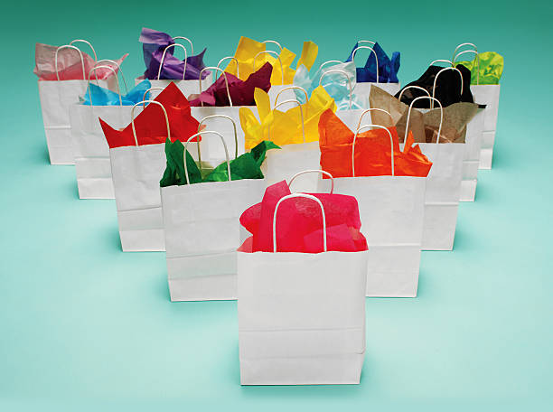 istock White Shopping Bags on Green 104240400