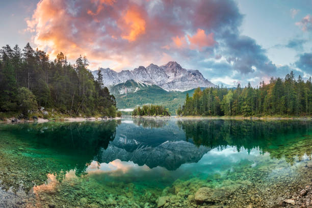 Mountain peak Zugspitze Summer day at lake Eibsee near Garmisch Partenkirchen. Bavaria, Germany Garmisch-Partenkirchen, Bavaria, Europe, Germany, Relief Map summer forest stock pictures, royalty-free photos & images