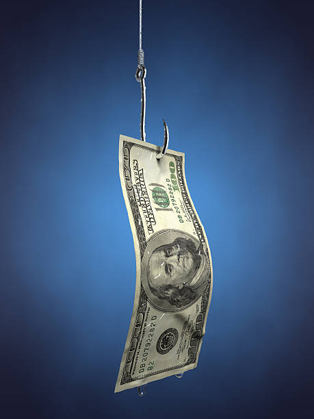 istock A one hundred dollar bill hanging on a fishing hook 104241029