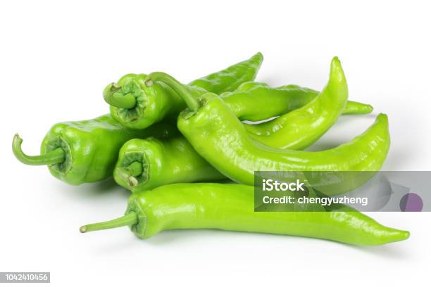 Green Pepper On A White Background Stock Photo - Download Image Now - Green Bell Pepper, Green Chili Pepper, Green Peppercorn