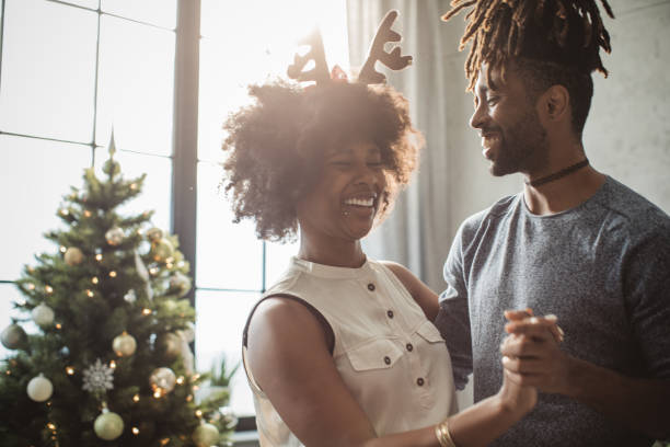 istock Couple dancing on Christmas 1042410890