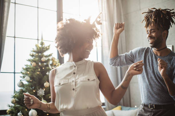 istock Couple dancing on Christmas 1042411200