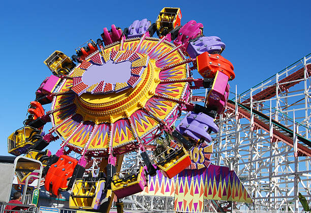 Amusement Park Ride  midway fair stock pictures, royalty-free photos & images