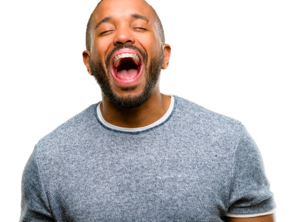 istock African american man with beard stressful, terrified in panic, shouting exasperated and frustrated. Unpleasant gesture. Annoying work drives me crazy 1042414360