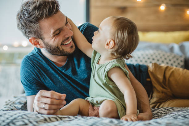 istock Father and daughter spend weekend at home 1042414590