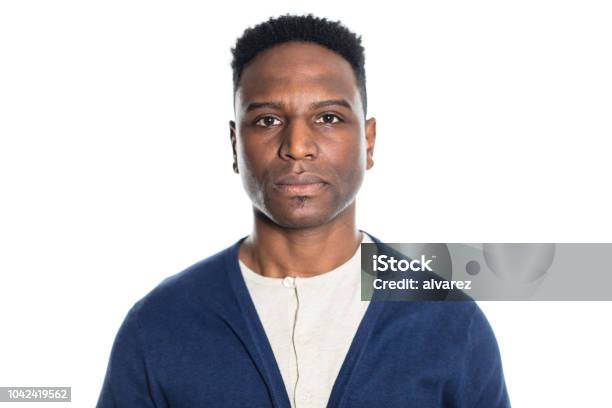 Portrait Of Mature African Man Looking Serious Stock Photo - Download Image Now - Men, African-American Ethnicity, White Background