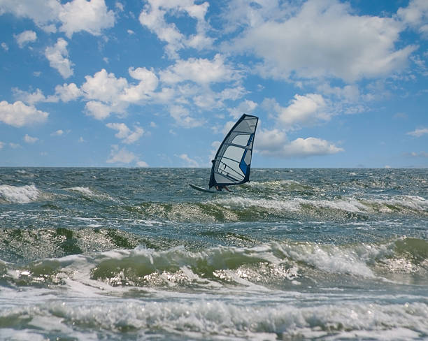 istock Windsurfer on the day sky background 104242126