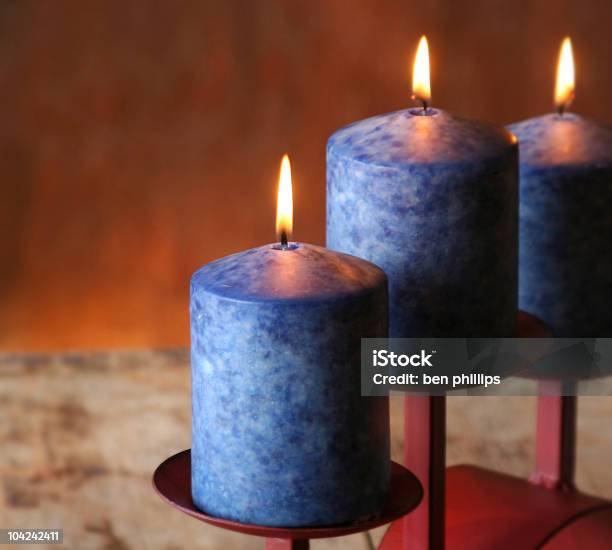 Trio Of Blue Candles Stock Photo - Download Image Now - Blue, Burning, Candle