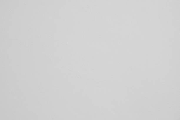 istock Old grunge abstract background texture White concrete wall 1042424398