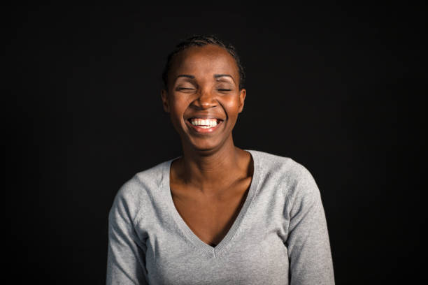 istock Cheerful young african woman 1042424842