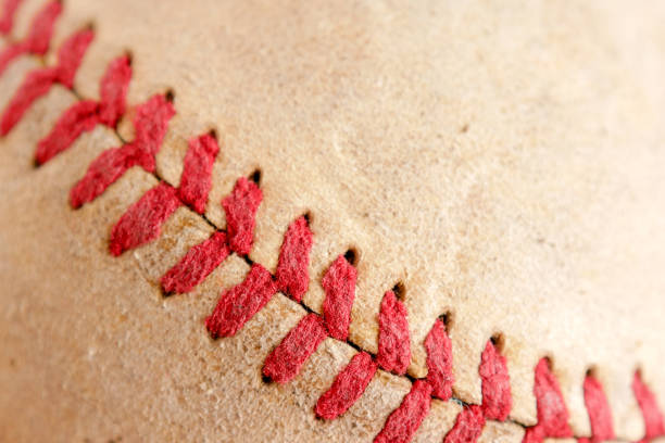 istock Sports Equipment old Baseball background texture 1042424918