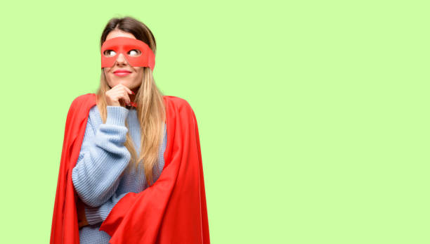 istock Young super woman thinking and looking up expressing doubt and wonder 1042425470