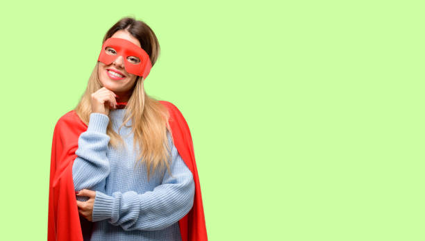 istock Young super woman thinking and looking up expressing doubt and wonder 1042425566