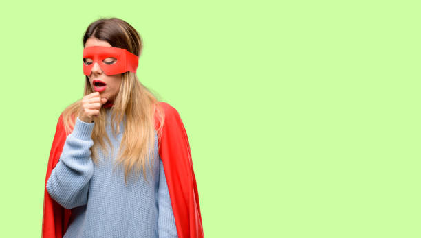 istock Young super woman sick and coughing, suffering asthma or bronchitis, medicine concept 1042425592