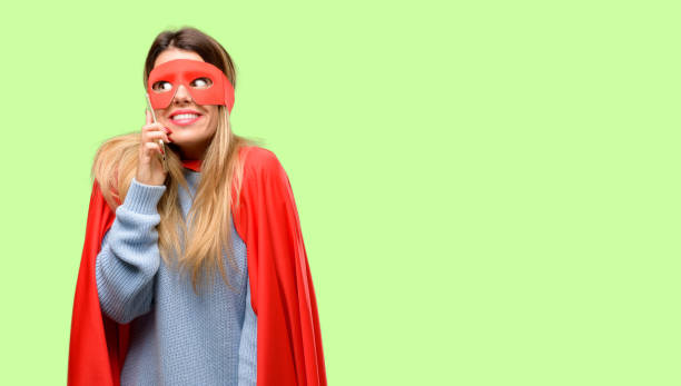 istock Young super woman happy talking using a smartphone mobile phone 1042425606