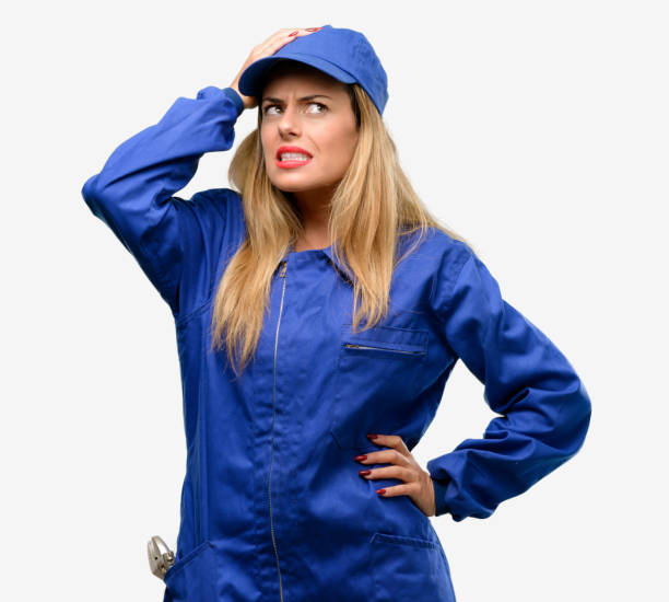 Young plumber woman doubt expression, confuse and wonder concept, uncertain future