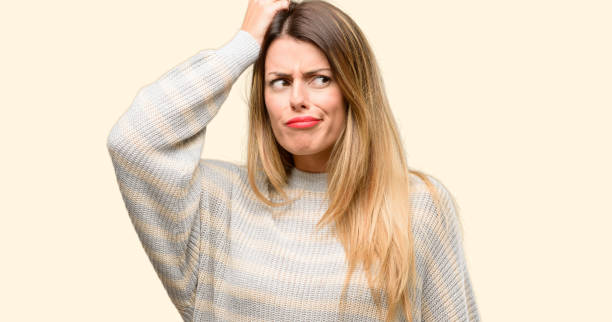 istock Young beautiful woman doubt expression, confuse and wonder concept, uncertain future 1042430002