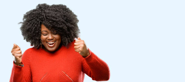 istock happy and surprised cheering expressing wow gesture 1042433000